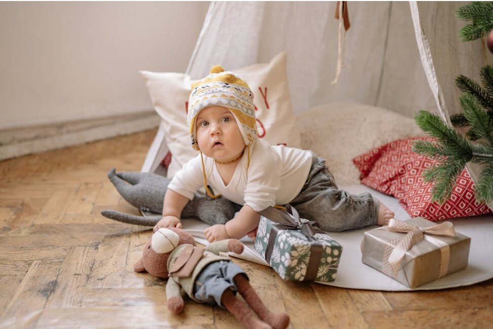 a baby with gifts