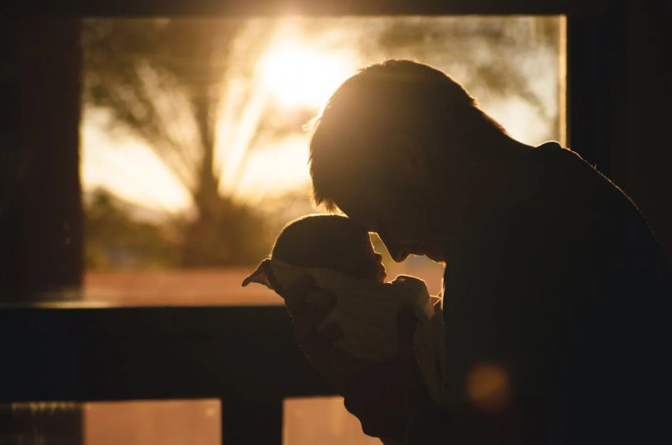 Dad bonding with baby