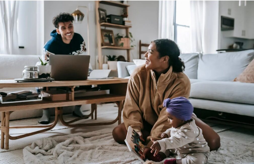 parents playing with baby