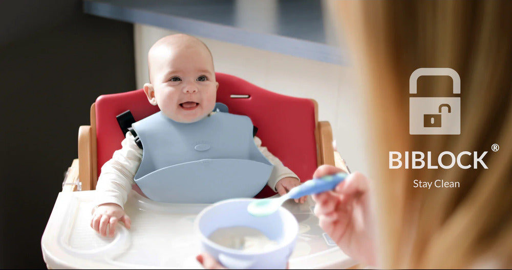 Baby wearing a silicone bib